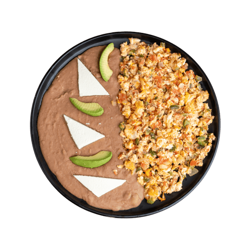 Mexican-style scrambled eggs with tomato, onion, and chili, served with beans.